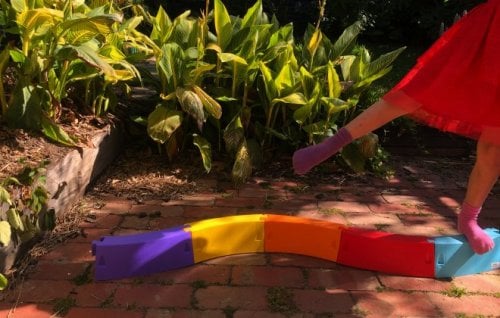 A young girl practises gymnastics.