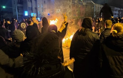 Iranians gather on the streets of Tehran.
